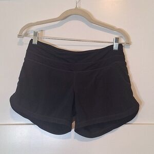 Lululemon Size 4 Black Running Shorts 4" Inseam Rear Zip Pocket Stretch